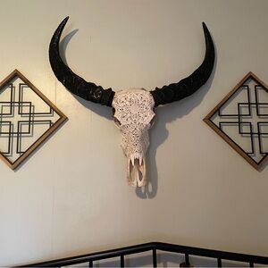 Real water buffalo skull intricately hand carved in a Bali fashion!